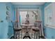 Inviting dining area featuring casual seating, outdoor views, and coastal decor for relaxed living at 15 A Par Dr # 27, Charleston, SC 29414