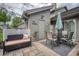 Outdoor patio featuring a seating area, umbrella, and well-maintained landscaping, perfect for relaxation at 15 A Par Dr # 27, Charleston, SC 29414