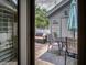 Charming patio area with comfortable seating and an umbrella, perfect for outdoor relaxation and entertaining at 15 A Par Dr # 27, Charleston, SC 29414