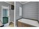 An elegant bathroom featuring a soaking tub and a separate glass-enclosed shower at 154 Patrick Ln, Summerville, SC 29483
