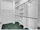 Spacious walk-in closet featuring custom shelving, hanging rods, and a well-organized storage system at 154 Patrick Ln, Summerville, SC 29483