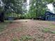 Spacious backyard with shed and trees at 1640 Dogwood Rd, Charleston, SC 29414