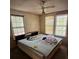Bedroom with two windows and a large bed at 1640 Dogwood Rd, Charleston, SC 29414