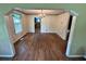 Classic dining room with hardwood floors, chandelier lighting, and detailed trim work at 1640 Dogwood Rd, Charleston, SC 29414