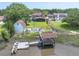 Desirable property featuring a spacious yard, shed, basketball court, and private dock at 1866 Capri Dr, Charleston, SC 29407