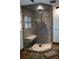 Bathroom featuring a glass shower with tiled walls and seat at 1866 Capri Dr, Charleston, SC 29407