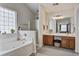 Bathroom featuring a jacuzzi tub, double vanity and separate shower at 2017 Asher Loop, Summerville, SC 29485