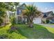 Charming two-story home with lush green lawn and attractive landscaping at 2017 Asher Loop, Summerville, SC 29485