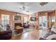Comfortable living room featuring a fireplace, hardwood floors, and ample seating at 2017 Asher Loop, Summerville, SC 29485