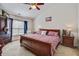 Bedroom featuring a ceiling fan, a king-size bed, and a TV at 2017 Asher Loop, Summerville, SC 29485
