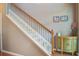 Staircase leading to the upper level, with decorative accents at 2017 Asher Loop, Summerville, SC 29485