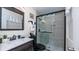 Bathroom features tile shower with glass enclosure, updated vanity, modern decor, and neutral colors at 2172 Palermo Pl, North Charleston, SC 29406