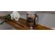 Close up of bathtub with wood tray, wine glass, candle, and flower for decoration at 2172 Palermo Pl, North Charleston, SC 29406