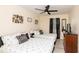 Cozy bedroom features two beds with a ceiling fan, window, and stylish decor at 2172 Palermo Pl, North Charleston, SC 29406