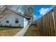 Charming single-story home features a well-manicured yard and a welcoming entrance with a paved walkway at 2172 Palermo Pl, North Charleston, SC 29406
