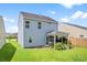 A view of the backyard and screened in porch at 251 Coosawatchie St, Summerville, SC 29485