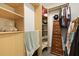 Organized closet with custom wood shelving and ample storage space for clothes and accessories at 2605 Mona Ave, Charleston, SC 29414