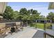 Cozy outdoor deck with seating area, overlooking a green lawn and shed at 2605 Mona Ave, Charleston, SC 29414