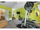Well-equipped exercise room with weightlifting equipment and scenic outdoor views at 2605 Mona Ave, Charleston, SC 29414