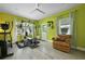 Spacious exercise room featuring gym equipment and a comfortable leather chair at 2605 Mona Ave, Charleston, SC 29414