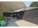 Covered patio with grill, fenced for privacy, perfect for outdoor entertaining at 2605 Mona Ave, Charleston, SC 29414