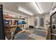 Large basement featuring storage shelves, work area, and a door to the exterior at 2649 Starfish Dr, Johns Island, SC 29455
