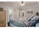 Spacious bedroom featuring a ceiling fan, hardwood floors, and neutral paint to allow for customization at 2649 Starfish Dr, Johns Island, SC 29455