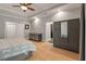 Serene bedroom with tray ceilings, built-in wardrobe, and neutral decor at 2649 Starfish Dr, Johns Island, SC 29455