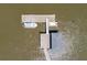 Aerial view of boat dock, and boat lift on the water at 2649 Starfish Dr, Johns Island, SC 29455