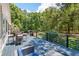 Spacious deck featuring comfortable seating and a table, perfect for outdoor entertaining at 2649 Starfish Dr, Johns Island, SC 29455