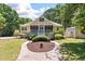 Charming two-story home with a welcoming screened porch and meticulously landscaped yard at 2649 Starfish Dr, Johns Island, SC 29455