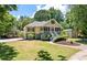 Charming two-story home with a welcoming screened porch and lush landscaping at 2649 Starfish Dr, Johns Island, SC 29455