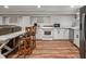 Kitchenette with oven, dishwasher, and bar seating at 2649 Starfish Dr, Johns Island, SC 29455