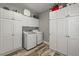 Bright laundry room with lots of storage and a laundry area at 2649 Starfish Dr, Johns Island, SC 29455