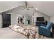 Spacious main bedroom features unique floors, ceiling fan, walk-in closet, and sitting area at 2649 Starfish Dr, Johns Island, SC 29455