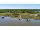 Picturesque view of waterway with docks, houses, and marsh land at 2649 Starfish Dr, Johns Island, SC 29455