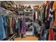 Organized walk-in closet with shelving and hanging racks provides ample storage space for clothes and accessories at 2649 Starfish Dr, Johns Island, SC 29455