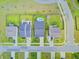 An aerial view of homes, showcasing manicured lawns, driveways, and neighborhood street layout at 266 Torslanda Ln, Summerville, SC 29486