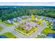 Community aerial displaying the playground, streetscape and manicured lawns creating a desirable neighborhood at 266 Torslanda Ln, Summerville, SC 29486