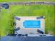 Aerial view of backyard with a rectangular in-ground pool, lounge chairs, and well-maintained lawn at 266 Torslanda Ln, Summerville, SC 29486
