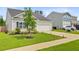 Beautiful one-story home featuring a well-kept lawn and a two car garage at 266 Torslanda Ln, Summerville, SC 29486