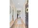 Inviting foyer with light wood floors and views into the living spaces at 266 Torslanda Ln, Summerville, SC 29486