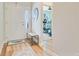Bright foyer with wood flooring, leading to other rooms at 266 Torslanda Ln, Summerville, SC 29486