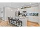 Open kitchen features granite countertops, stainless steel appliances, and tiled backsplash at 266 Torslanda Ln, Summerville, SC 29486