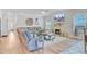 Inviting living room featuring a fireplace and comfortable seating arrangement at 266 Torslanda Ln, Summerville, SC 29486