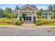 Community mailboxes with sidewalks, landscaping and a designated handicapped reserved parking spot at 266 Torslanda Ln, Summerville, SC 29486