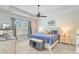 Spacious main bedroom features a tray ceiling, ceiling fan and ensuite bathroom at 266 Torslanda Ln, Summerville, SC 29486