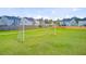 View of the neighborhood soccer field on a grassy lawn for residents to enjoy at 266 Torslanda Ln, Summerville, SC 29486