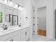 Modern bathroom with double vanity, sleek fixtures, and a walk-in shower with glass door at 2872 Edenborough Rd, Johns Island, SC 29455