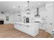Bright kitchen with a large island, modern appliances, and stylish pendant lighting at 2872 Edenborough Rd, Johns Island, SC 29455